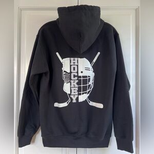 Black Hockey Sweatshirt With White Helmet On Back Size Small Women’s
